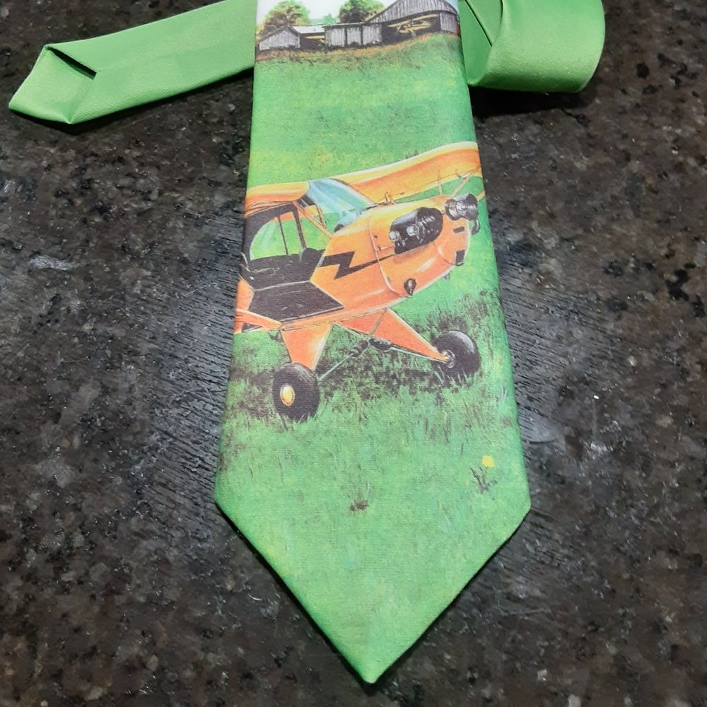 What a unique airplane tie from Ralph Marlin!  #59
